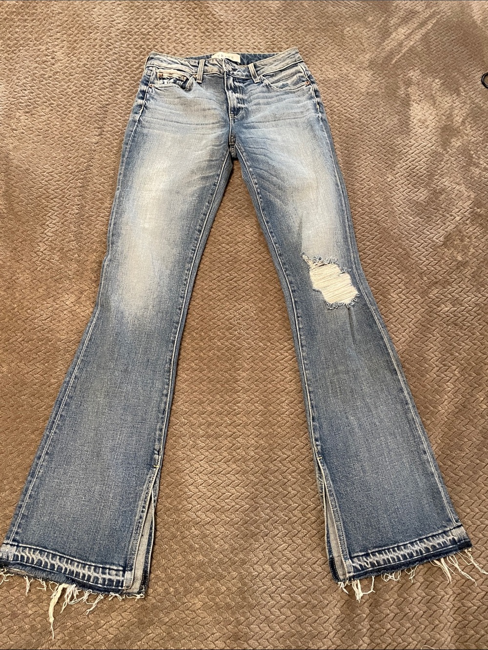Women's Light Blue Distressed Flare Jeans